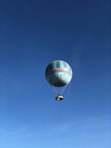 leisure activities flying gray hot air balloon during daytime aircraft